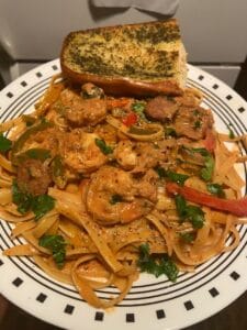 "Seduction in a Skillet: Creamy Cajun Shrimp Pasta with Sausage - A